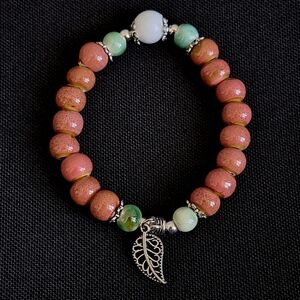 💎 3/$25 Elegant Ceramic Beaded Bracelet with Leaf Charm